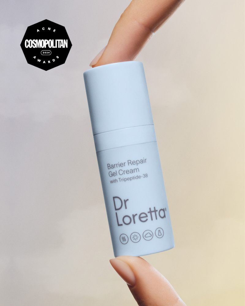 Dr Loretta Barrier Repair Gel Cream held by a hand with a Cosmopolitan Award logo.